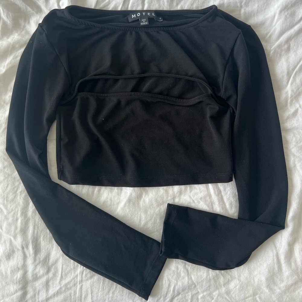 Black long sleeve top with cutout